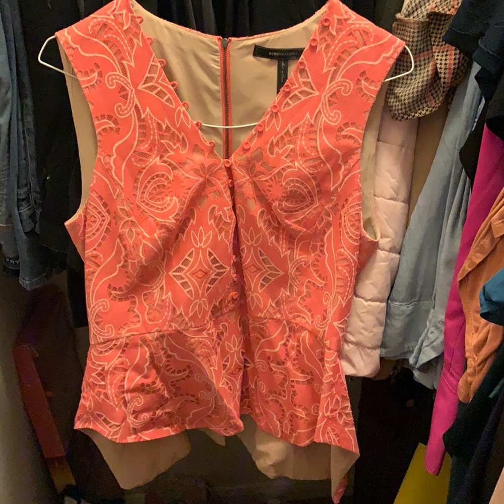Great blouse to pair with jeans. Have only worn a few times.